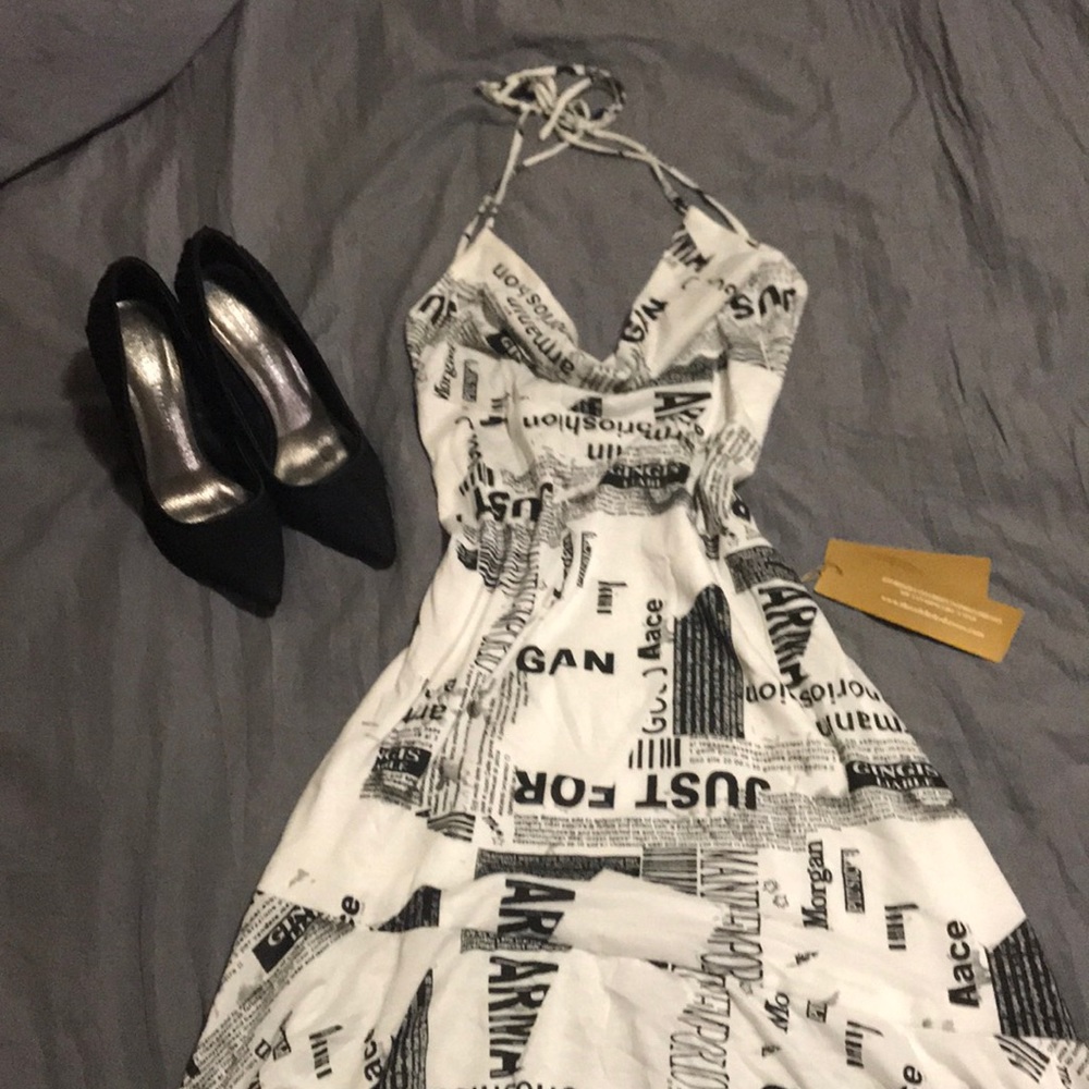 Asymmetrical newspaper dress